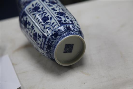 A Chinese blue and white bottle vase, Qianlong mark but later painted in Ming style, 20cm